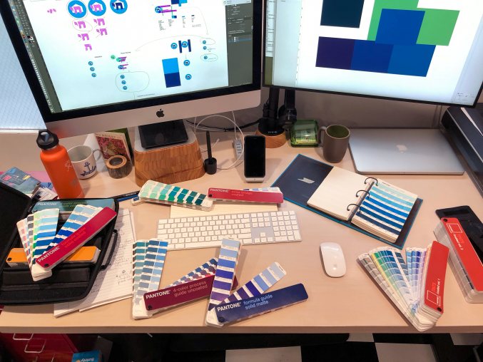 The very Pantone-covered desk of our creative director, Neal.